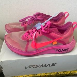 Pink zoom fly off white tulips